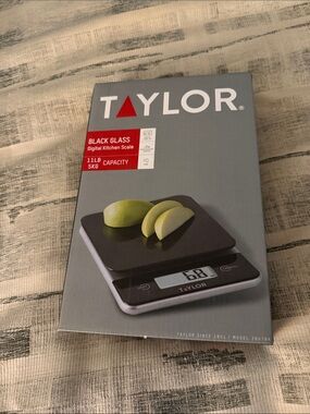 Taylor Black Glass Digital Kitchen Scale with Gray Packaging and Red Accent